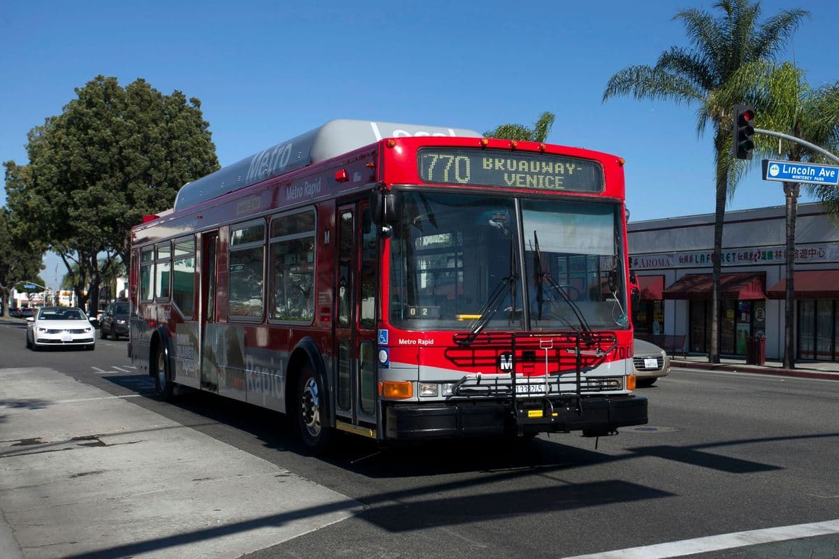 Metro Rapid bus on Broadway to Venice in Los Angeles, capturing urban transit life.